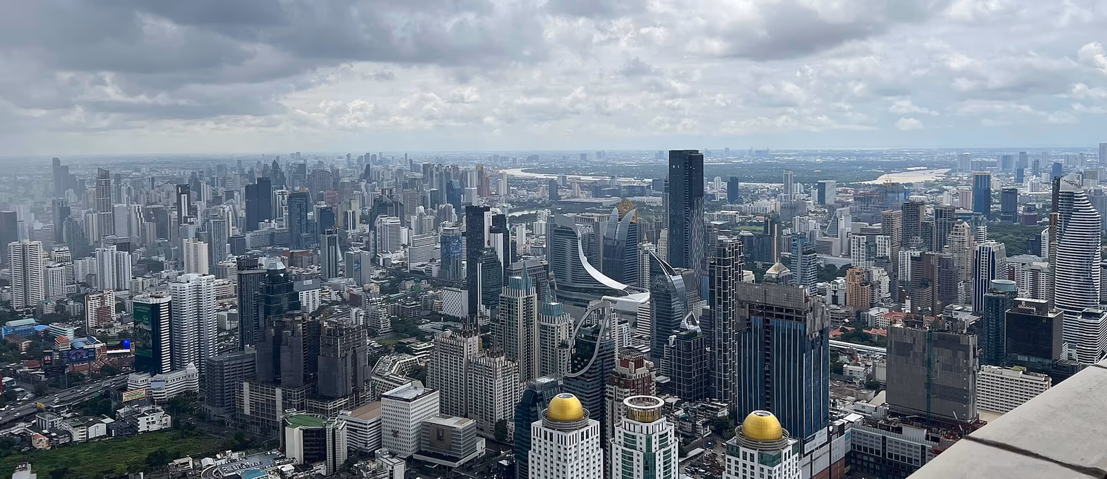 Bangkok Sukhumvit skyline with completed condominium towers at dusk